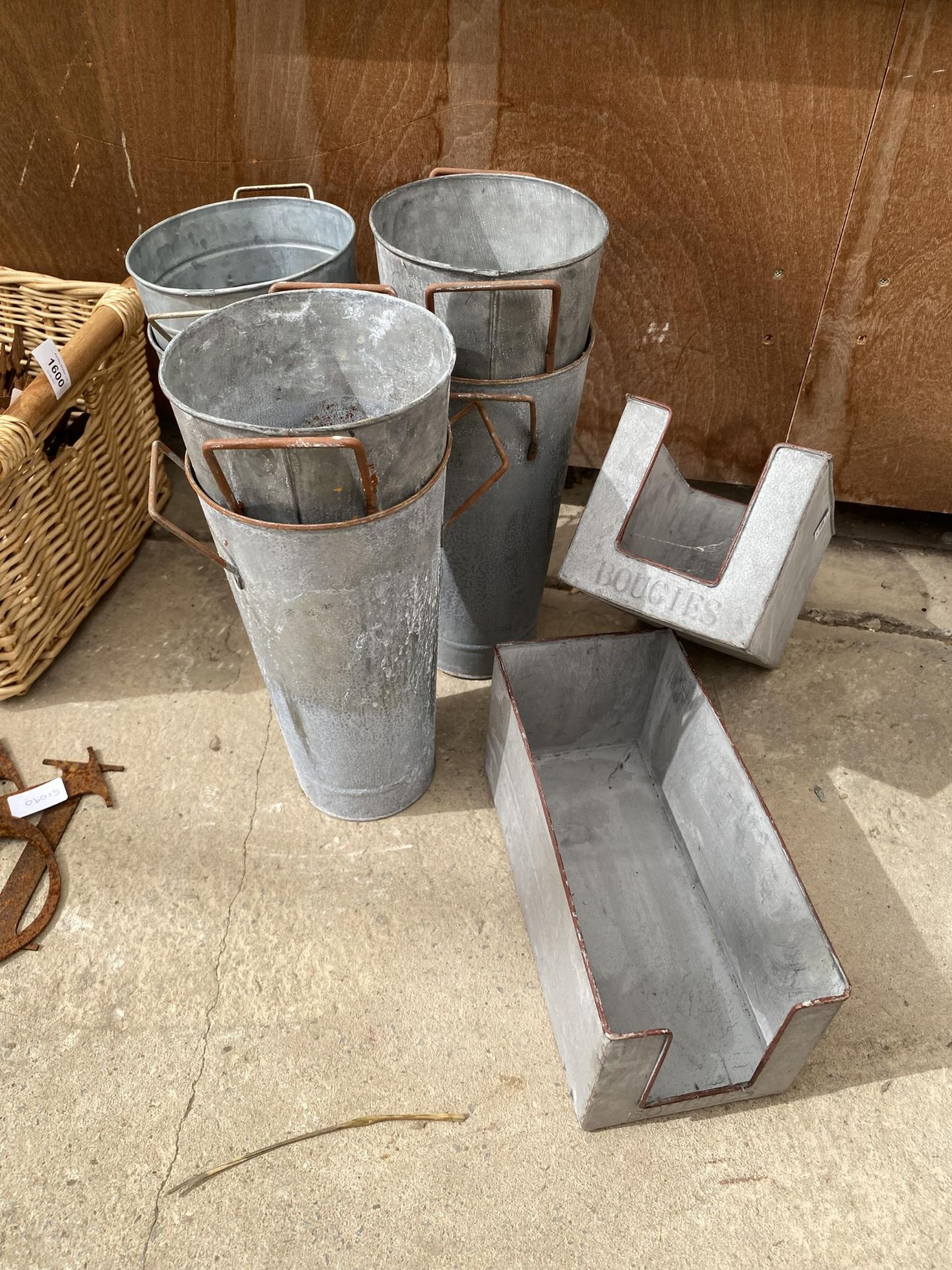 AN ASSORTMENT OF METAL PLANTERS