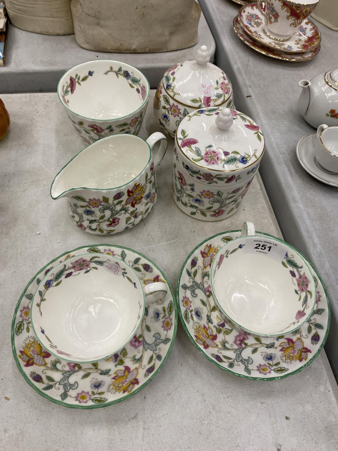 A QUANTITY OF MINTON 'HADDON HALL' TO INCLUDE TWO CUPS AND SAUCERS, TWO PRESERVE POTS, SUGAR BOWL