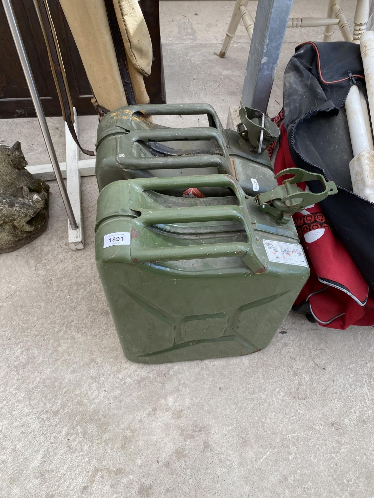 TWO GREEN METAL JERRY CANS