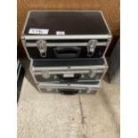 THREE HARD CASED BLACK STORAGE CASES