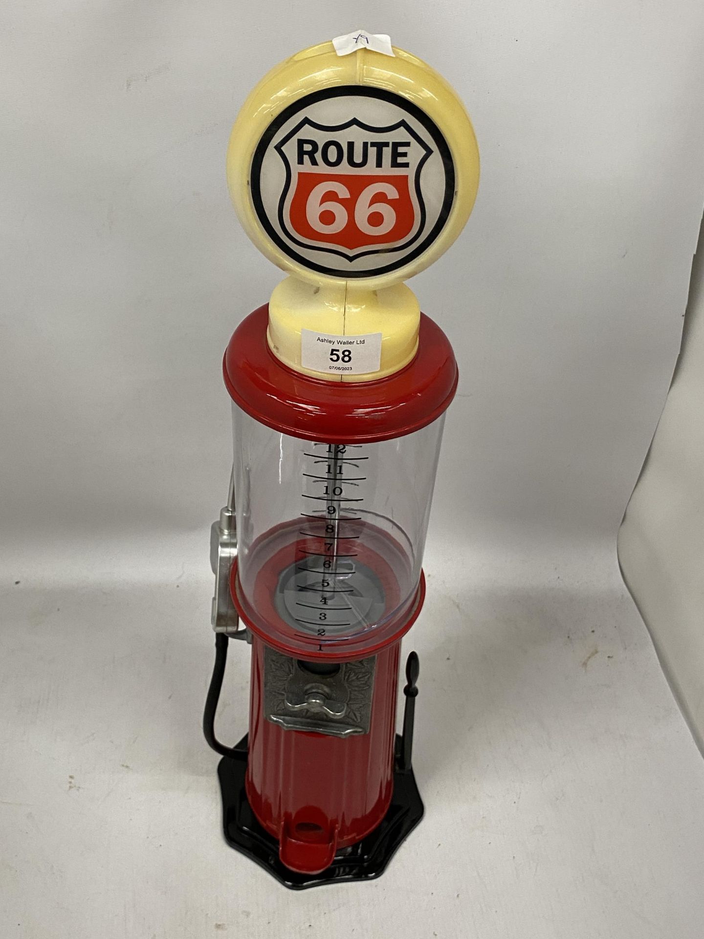 A ROUTE 66 PETROL PUMP DESIGN BUBBLEGUM MACHINE, HEIGHT 55CM