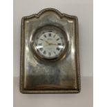 A ROBERT CARR SHEFFIELD HALLMARKED SILVER SMALL CLOCK WITH MILLENIUM 2000 HALLMARKS, 9 X 6CM