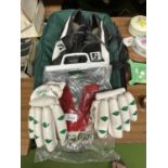 A PAIR OF PUMA FOOTBALL BOOTS & CRICKET BATTING GLOVES