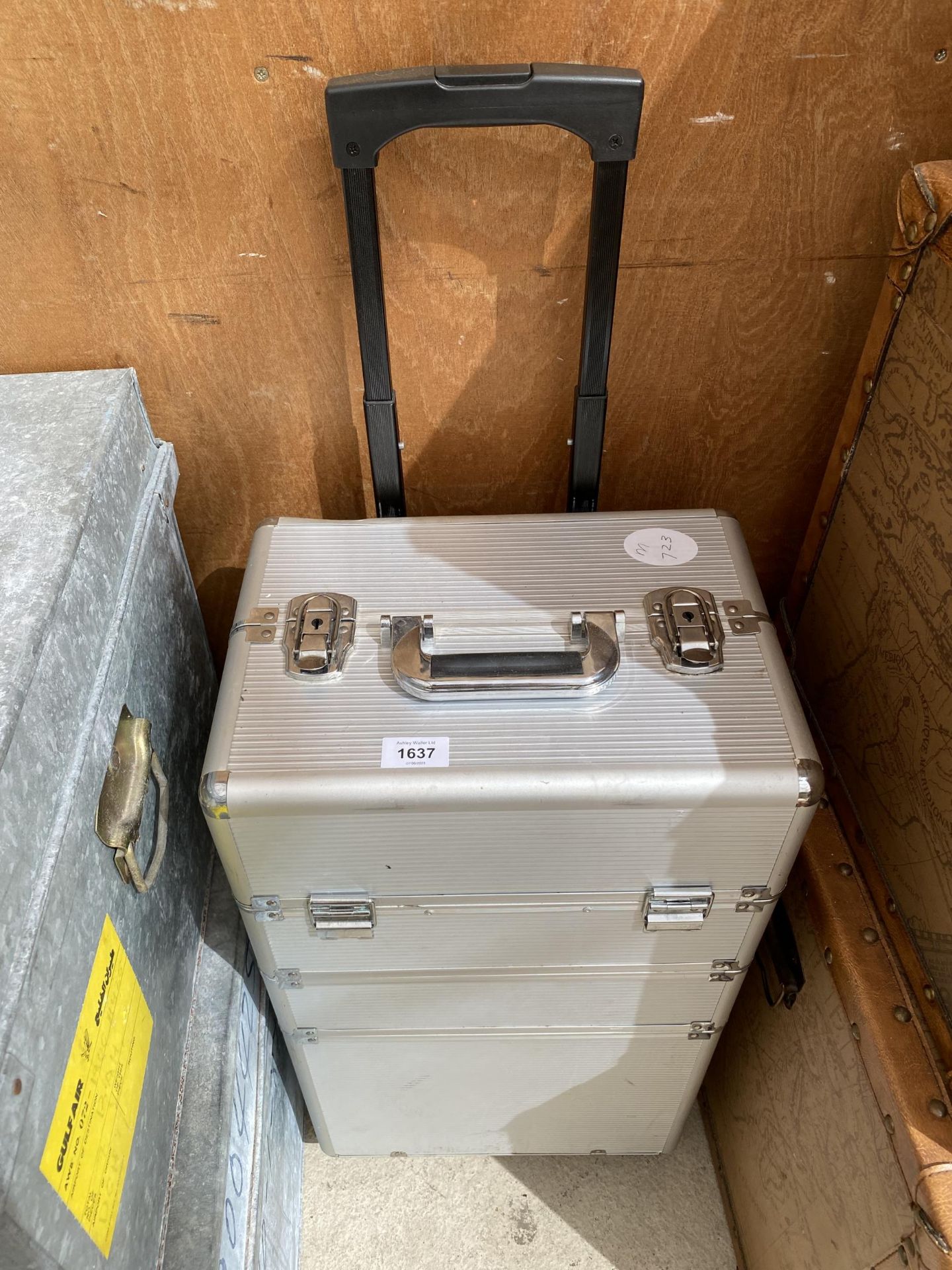 A TWO WHEELED HARD CASED VANITY TROLLEY