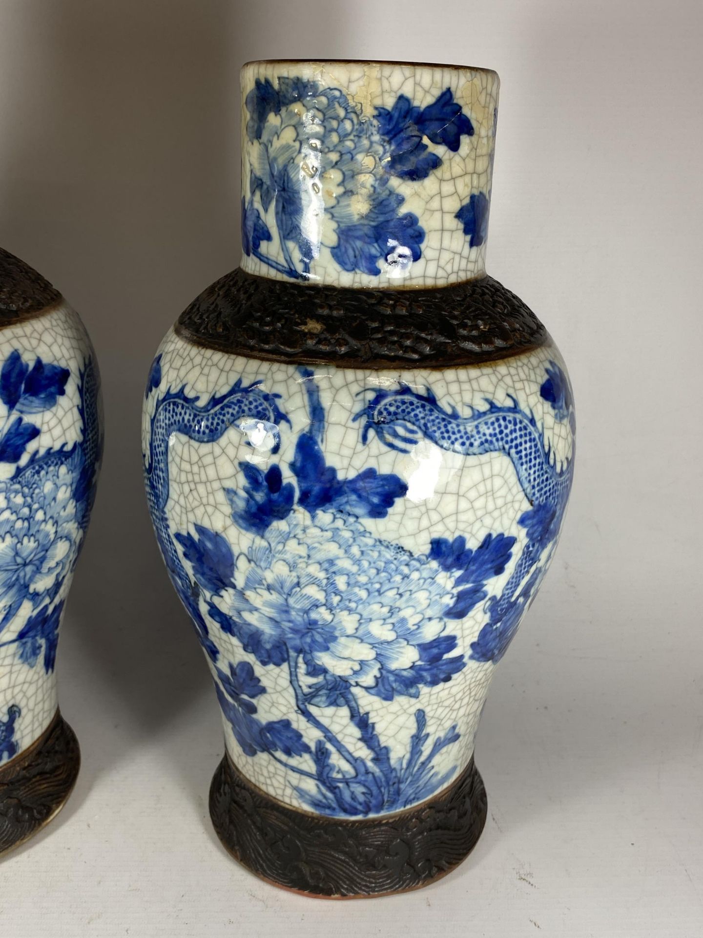 A PAIR OF EARLY 20TH CENTURY CHINESE BLUE AND WHITE CRACKLE GLAZE DRAGON DESIGN VASES, A/F, HEIGHT - Image 10 of 13