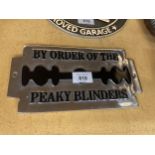 A CHROME 'PEAKY BLINDERS' SIGN 25CM X 13CM