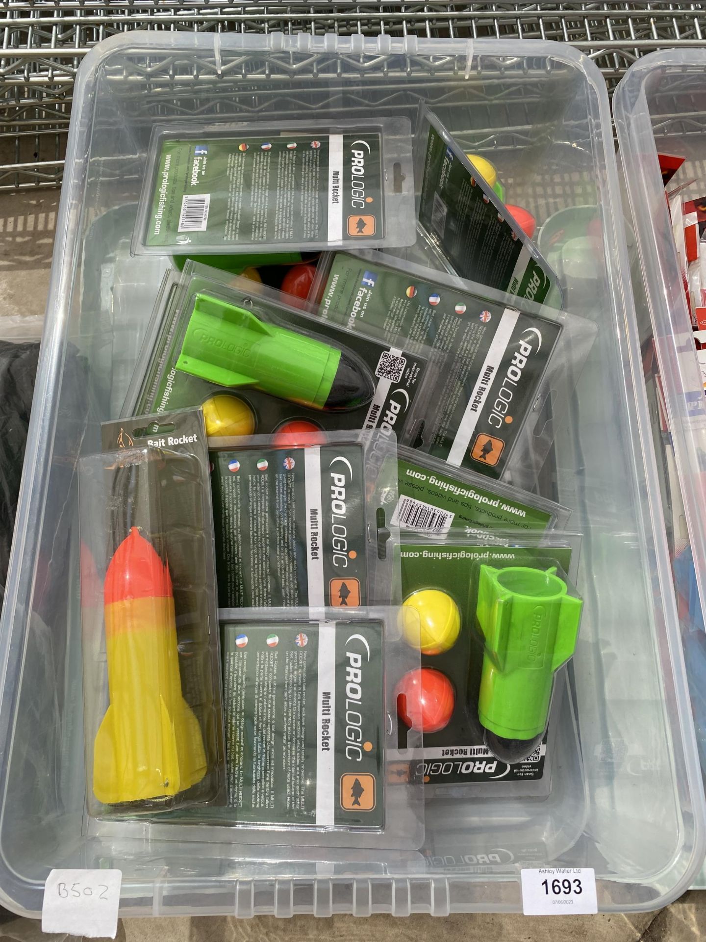 A BOX CONTAINING AN ASSORTMENT OF BAIT ROCKETS (FROM A TACKLE SHOP CLEARANCE)