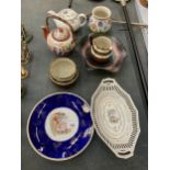 A QUANTITY OF CERAMIC ITEMS TO INCLUDE TEAPOTS, A GLASS CARNIVAL BOWL, JUG AND BOWL SET, CABINET