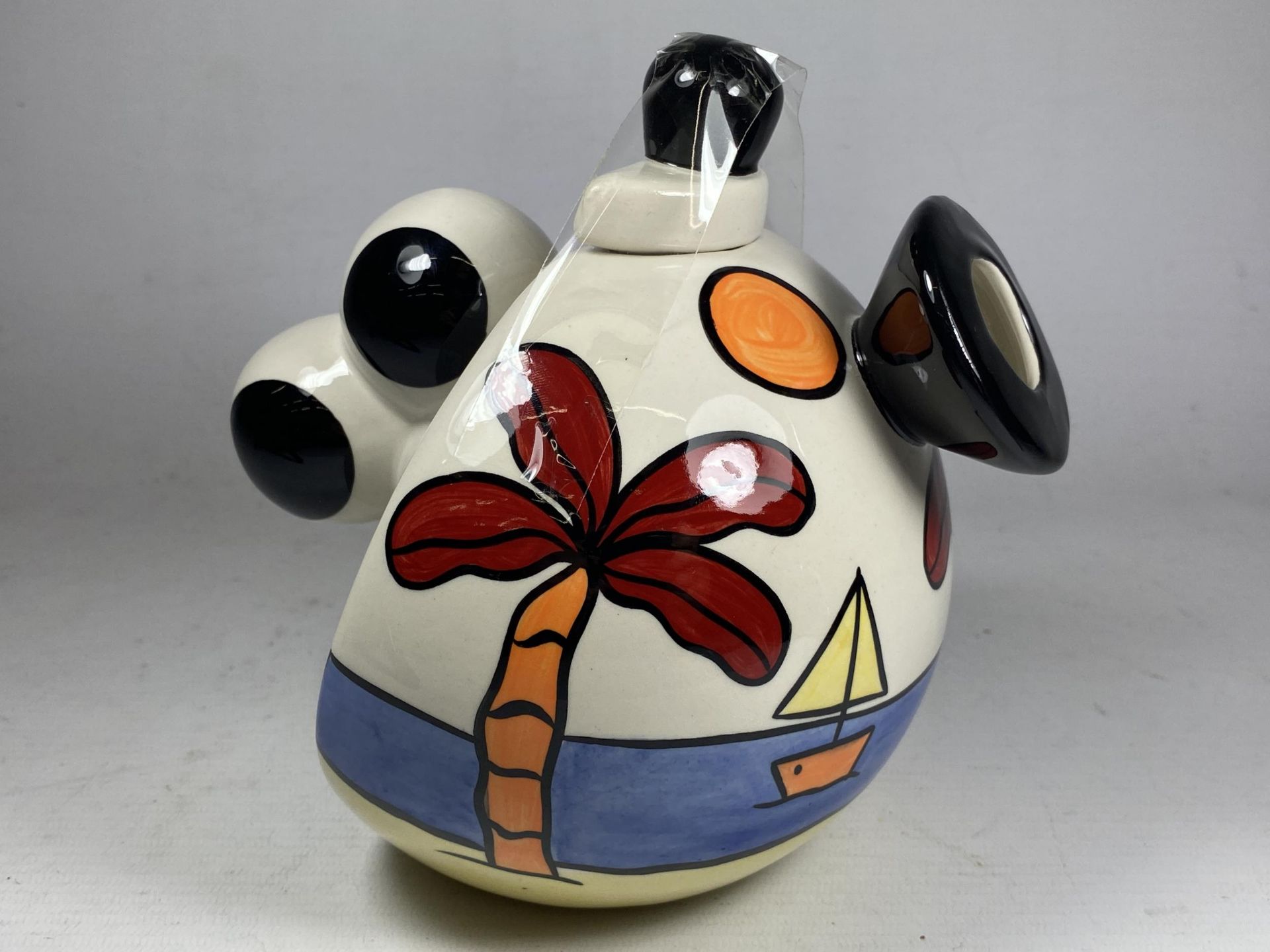 A LORNA BAILEY TROPICANO TEAPOT WITH BALLOON HANDLE