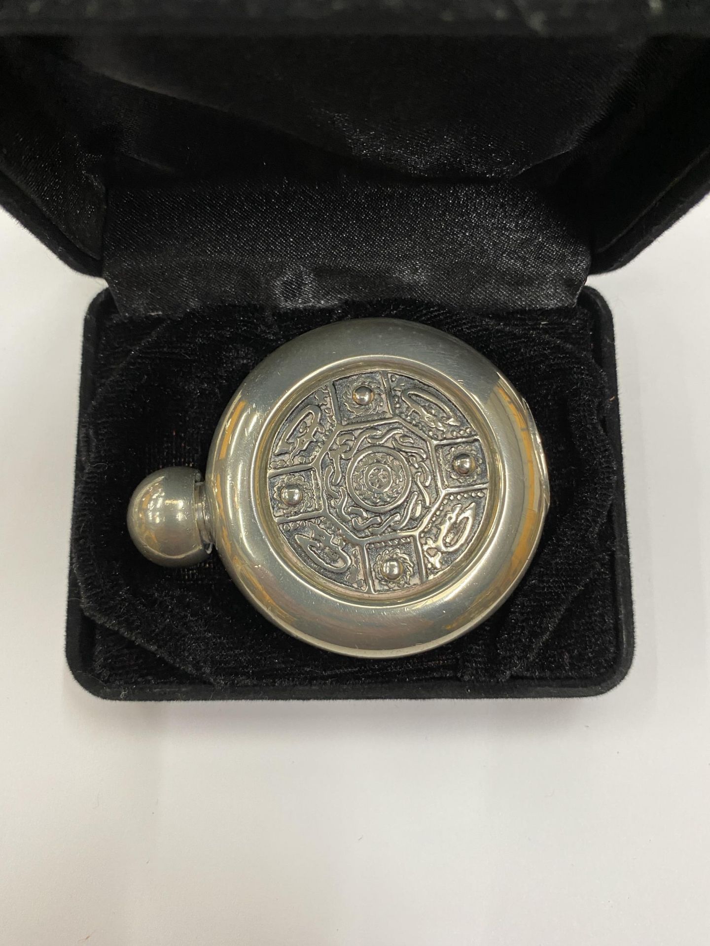 A BOXED PEWTER CELTIC HIP FLASK