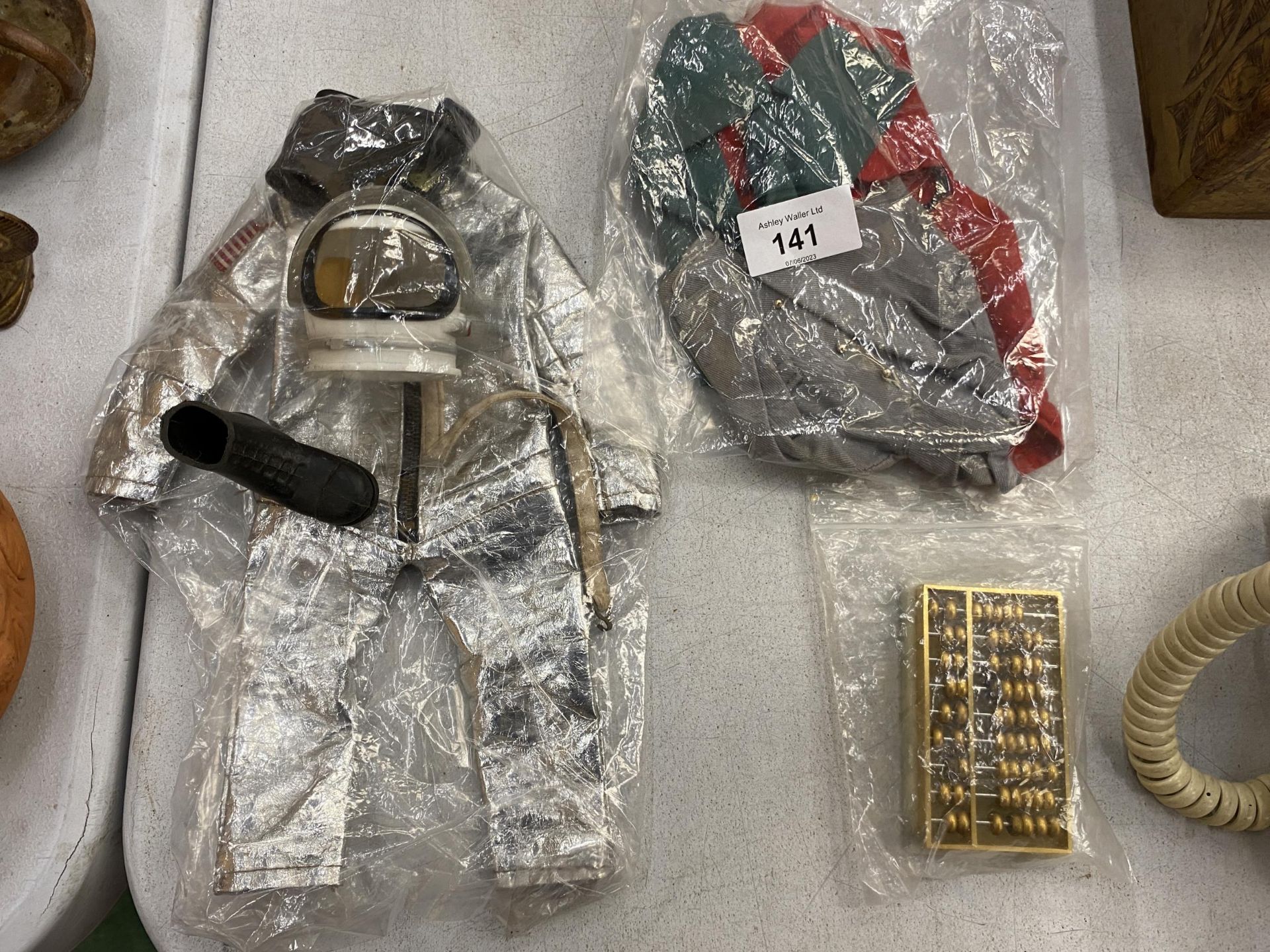 A QUANTITY OF VINTAGE ACTION MAN CLOTHES TO INCLUDE A SPACE SUIT