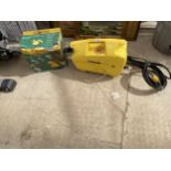 A KARCHER 411A ELECTRIC PRESSURE WASHER AND AN ELECTROLUX STEAMER