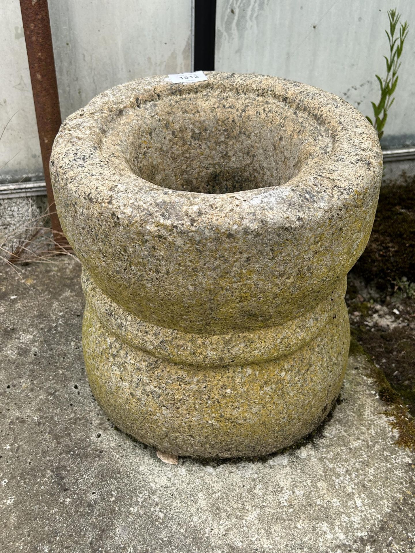 A VINTAGE INDIAN STONE MORTAR, 12" DIAMETER