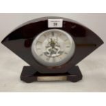 A WOODEN CASED SKELETON MANTLE CLOCK WITH HALLMARKED SILVER PRESENTATION PLAQUE, HEIGHT 22CM