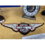 A CAST HARLEY DAVIDSON SIGN