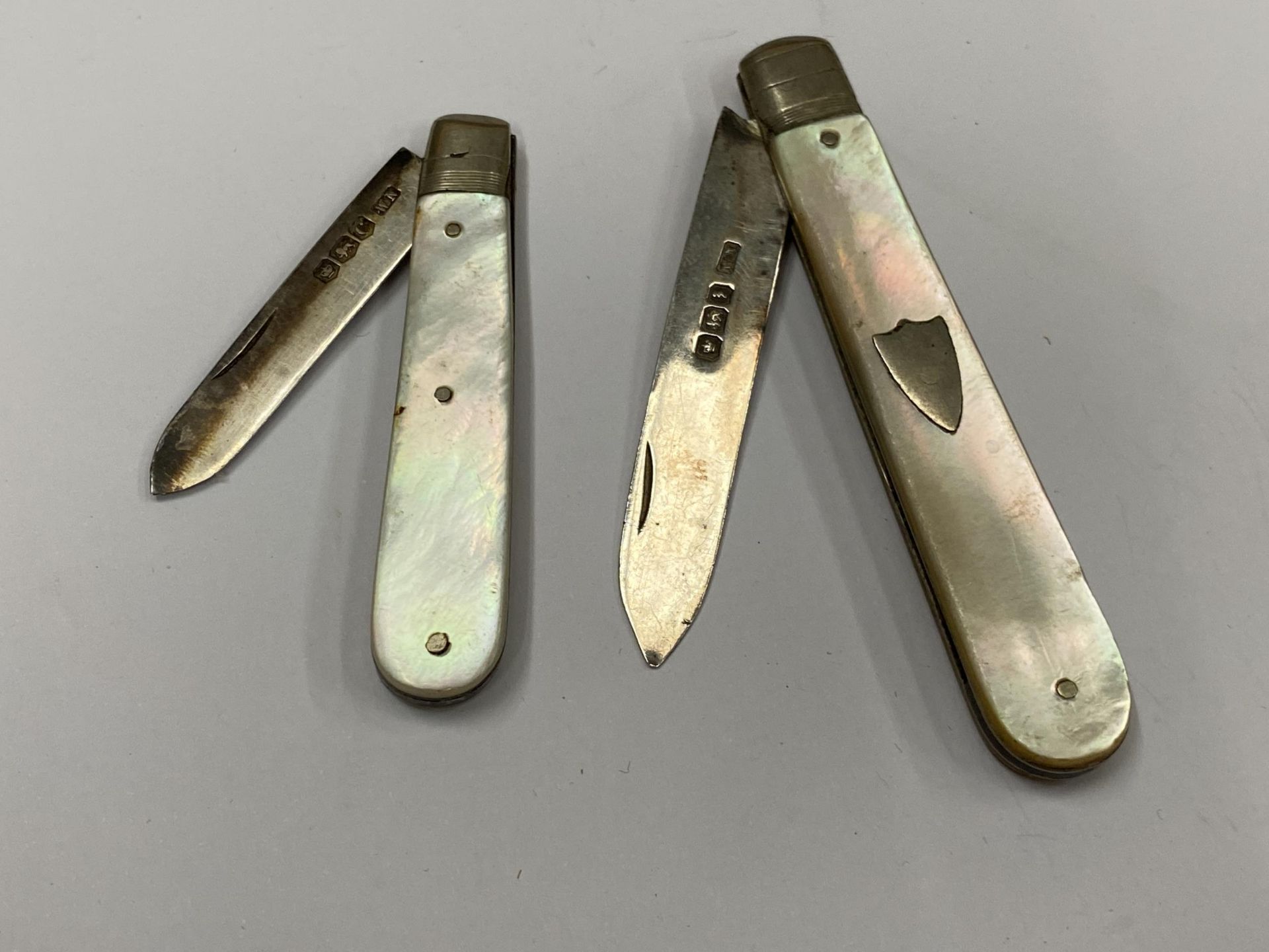 TWO MOTHER OF PEARL AND HALLMARKED SILVER FRUIT KNIVES