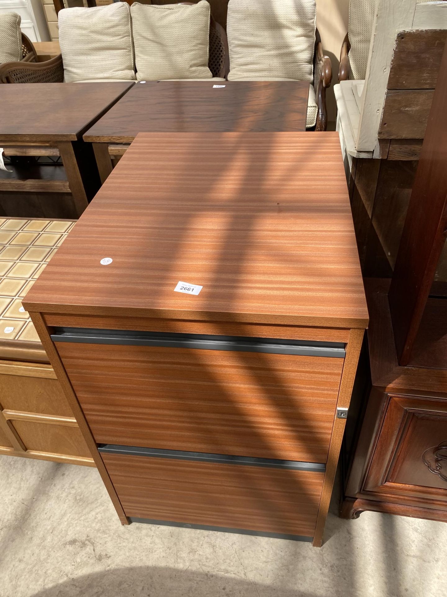 A MODERN TWO DRAWER FILING CABINET