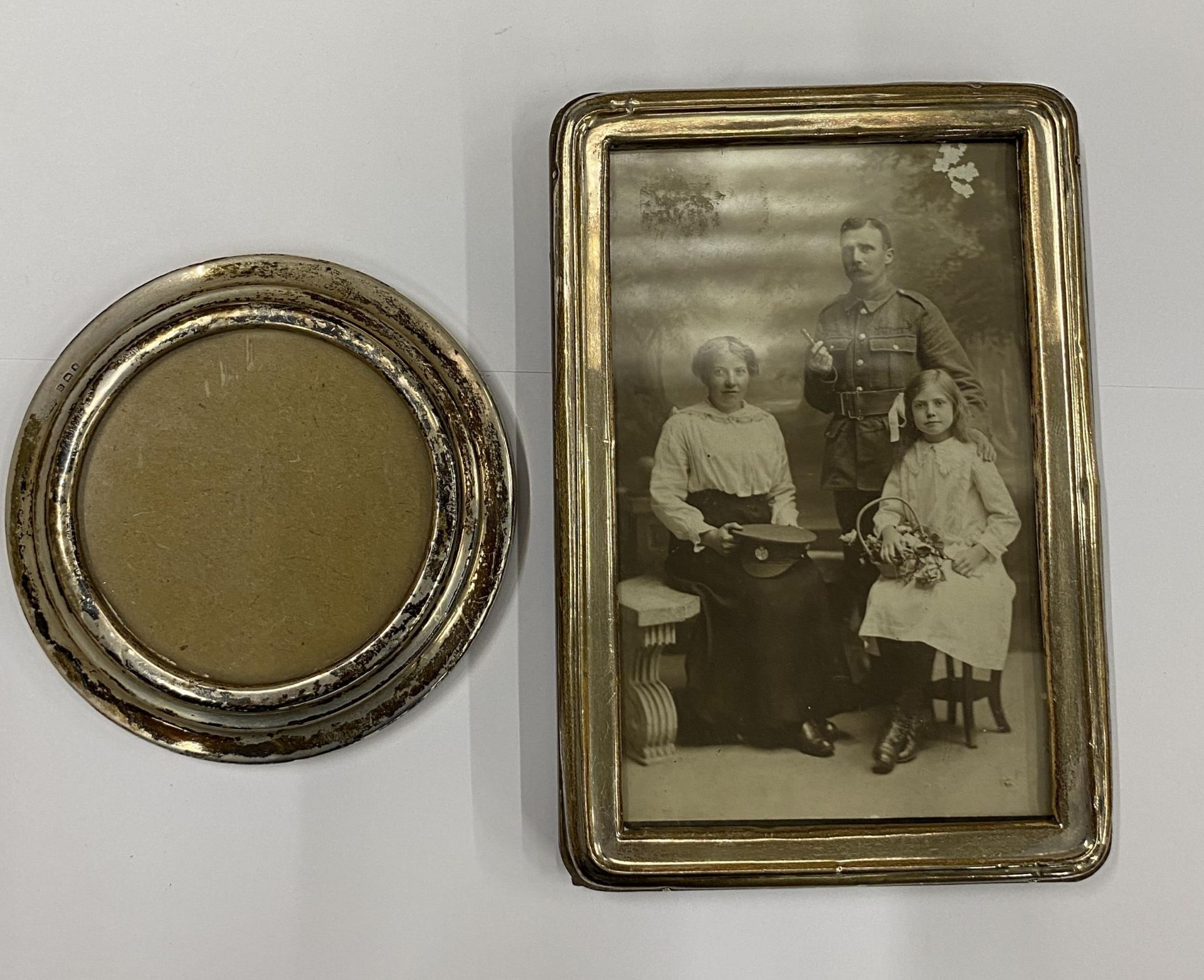 TWO HALLMARKED SILVER PHOTO FRAMES, LARGEST 15.5 X 10 CM