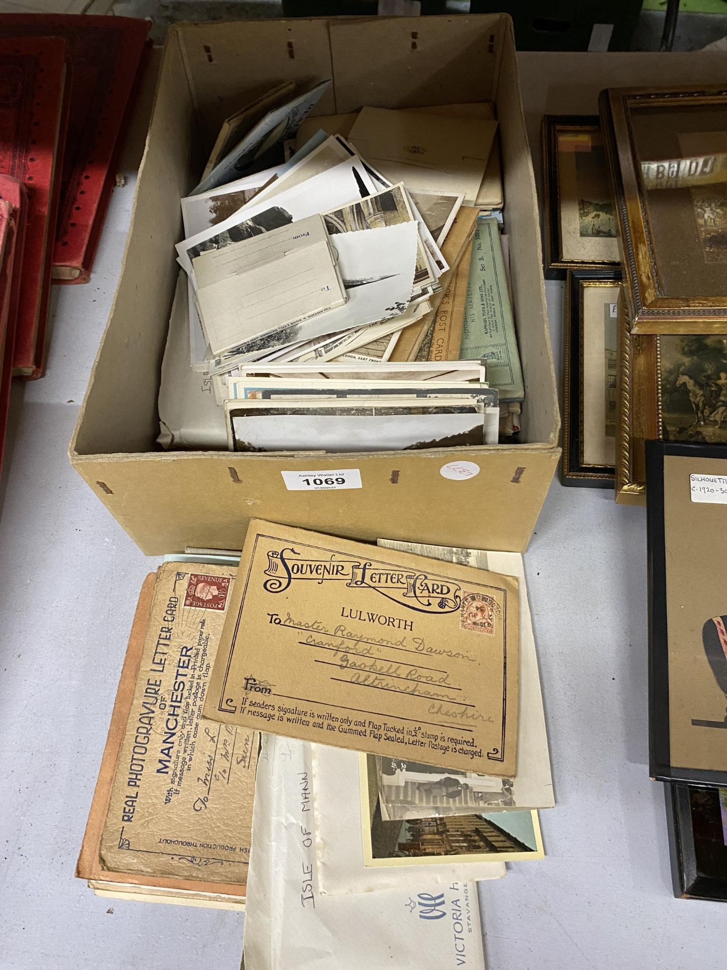 A BOX OF VINTAGE POSTCARDS