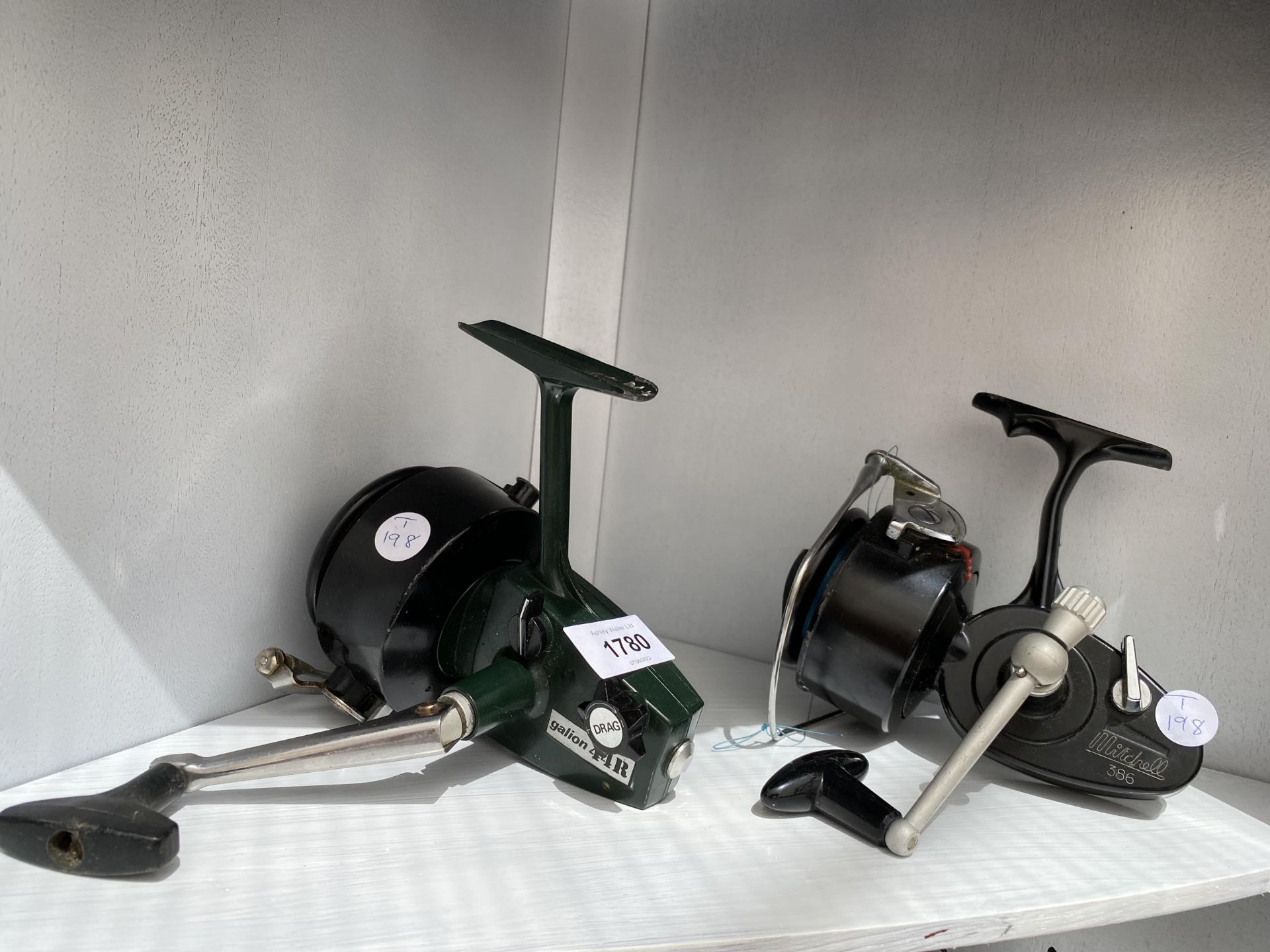 TWO FISHING REELS TO INCLUDE A MITCHELL 386