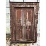 A PAIR OF INDIAN HARDWOOD PANELLED DOORS, 83 X 56" TO INCLUDE FRAME