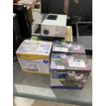 AN ASSORTMENT OF ITEMS TO INCLUDE A PROJECTOR AND A MINI SEWING MACHINE ETC