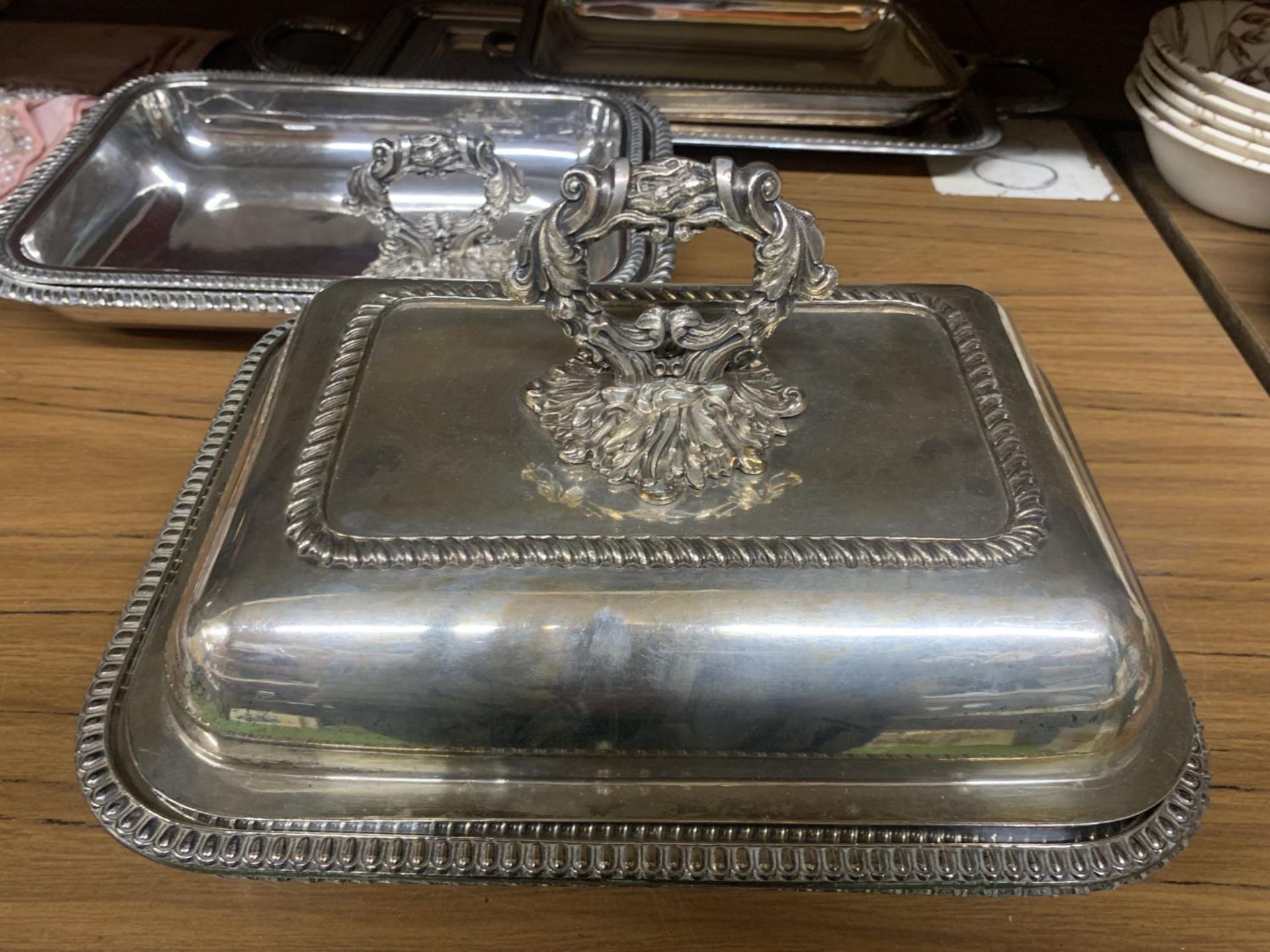 TWO SILVER PLATED HANDLED SERVING TRAYS PLUS FOUR SERVING DISHES, ONE WITH LID - Image 2 of 3