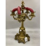 A VINTAGE BRASS FIVE BRANCH CANDLEABRA WITH CHERUB DESIGN BASE, HEIGHT 47CM