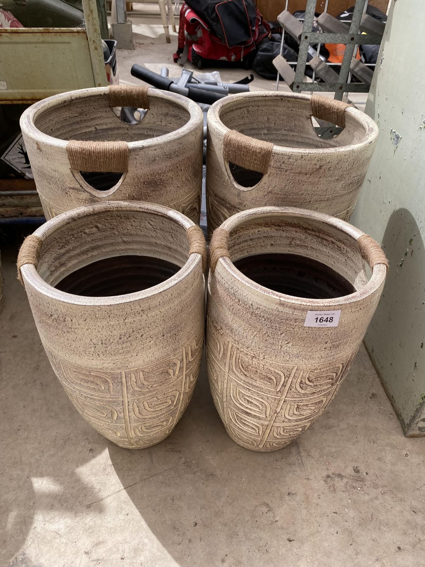 A SET OF FOUR AS NEW GRADUATED TWIN HANDLE TERRACOTTA PLANTERS (2 LRG AND TWO SMALL)