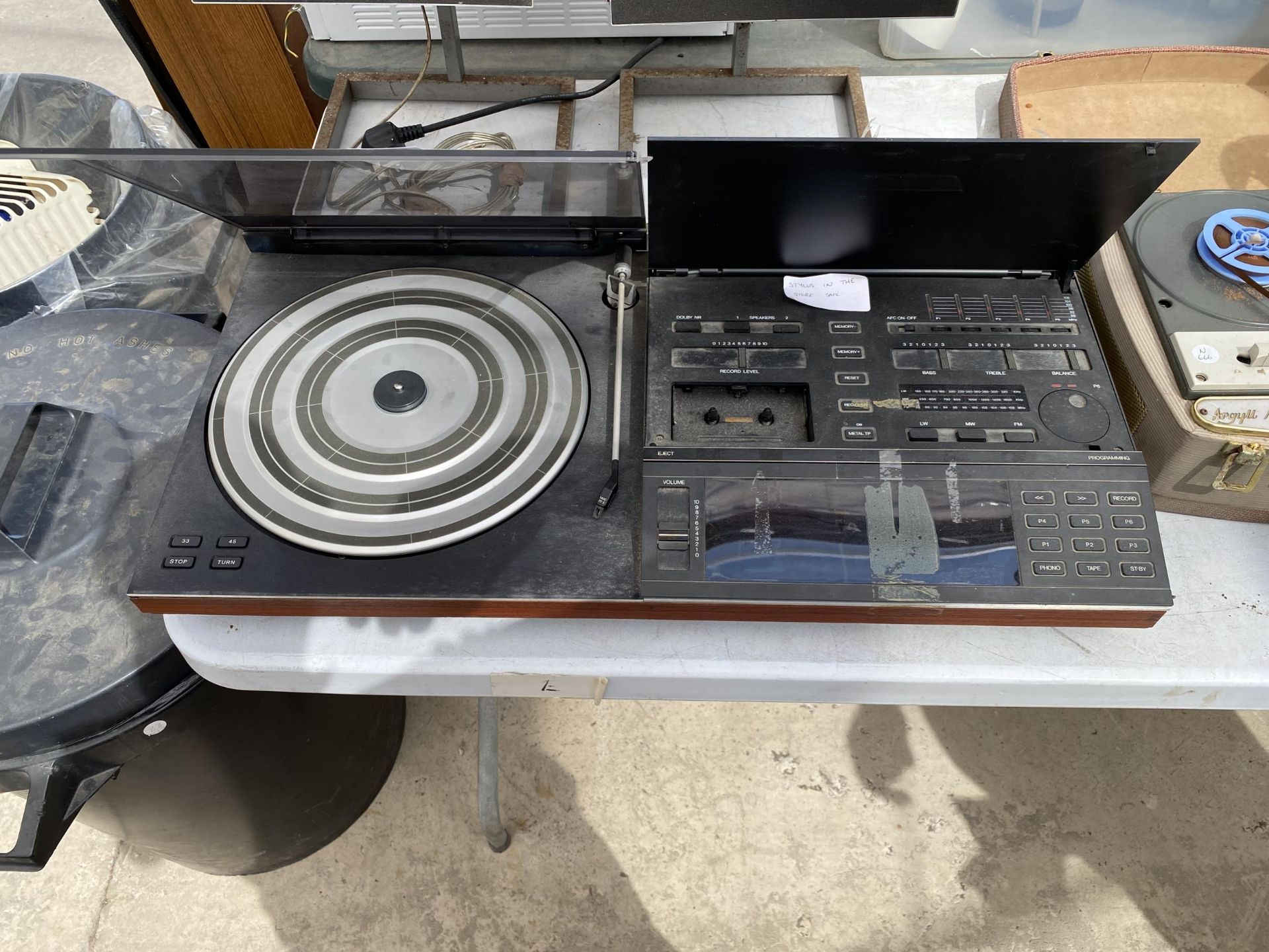 A BANG AND OULFSEN BEOCENTER 5000 RECORD DECK WITH BANG AND OULFSEN MMC 20E STYLUS WHICH IS BELIEVED