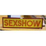 A 'SEXSHOW' ILLUMINATED BOX SIGN, 19 X 71CM