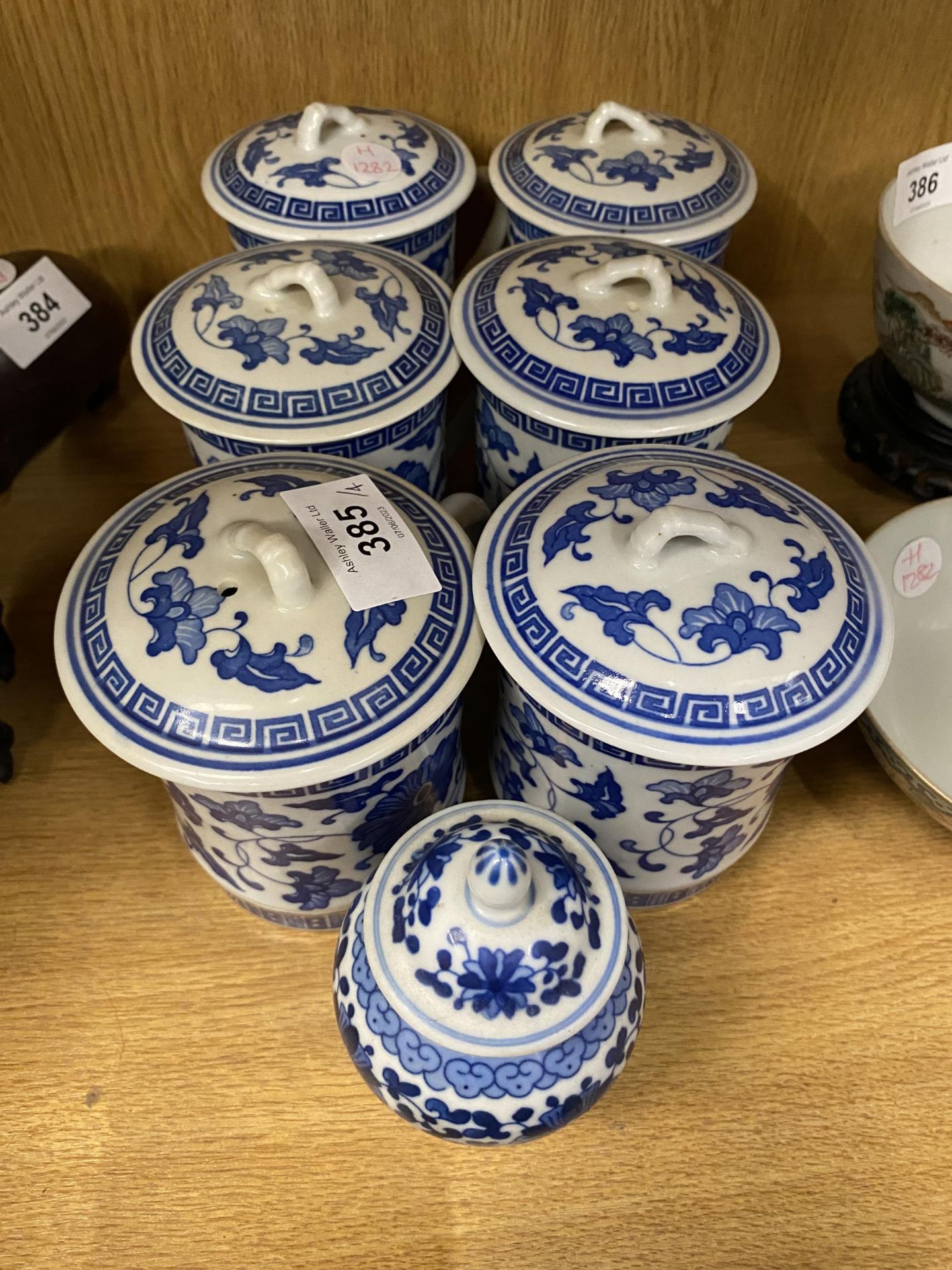 A GROUP OF MODERN CHINESE BLUE AND WHITE ITEMS - LIDDED JAR AND SET OF SIX LIDDED MUGS - Image 6 of 6