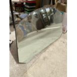 A DOMED ART DECO UNFRAMED BEVELED EDGE WALL MIRROR