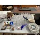 A LARGE ASSORTMENT OF CERAMICS AND GLASS WARE TO INCLUDE DOLPHINS, A CLOCK AND PLATES ETC