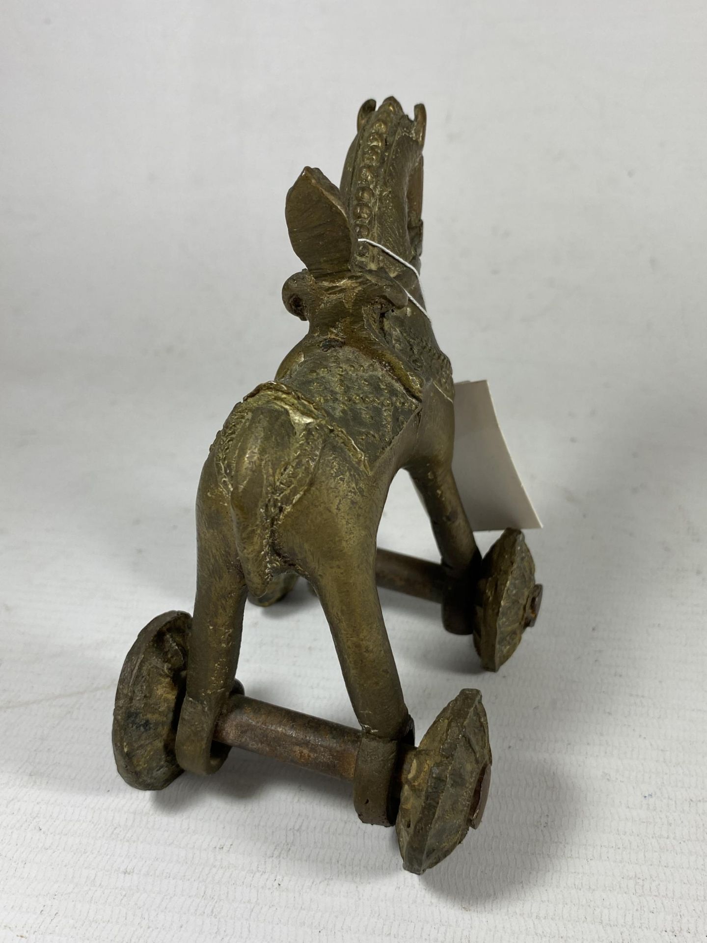 AN UNUSUAL 19TH CENTURY INDIAN METAL TEMPLE TOY MODEL OF A HORSE AND RIDER, HEIGHT 12CM - Image 3 of 4