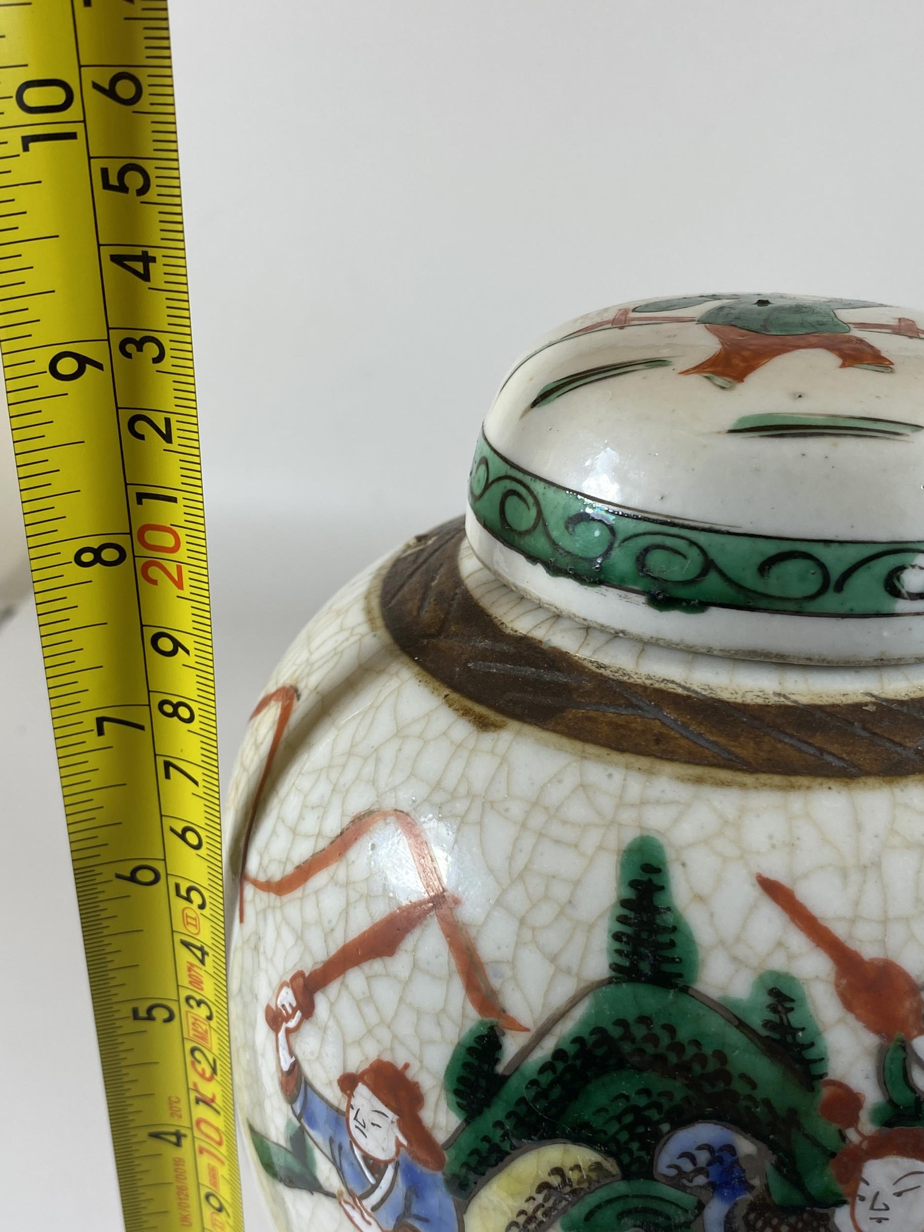 A LATE 19TH/EARLY 20TH CENTURY CHINESE CRACKLE GLAZE WARRIOR DESIGN GINGER JAR ON CARVED WOODEN - Image 7 of 7