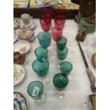 A QUANTITY OF VINTAGE GREEN AND CRANBERRY WINE GLASSES, SOME HAND BLOWN