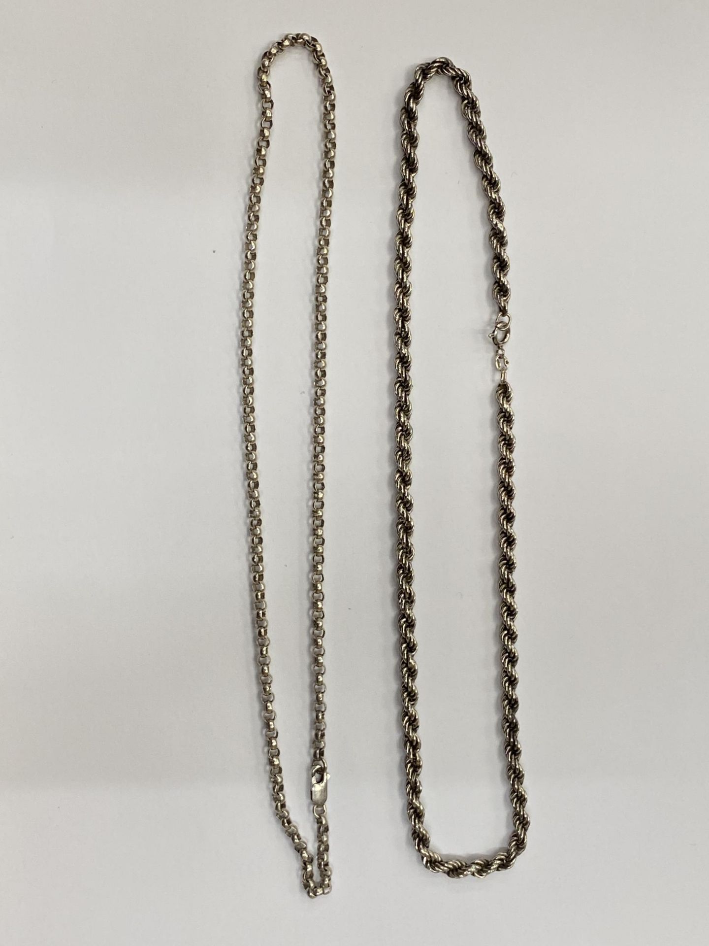 TWO SILVER WATCH CHAINS