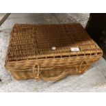 A VINTAGE WICKER PICNIC BASKET