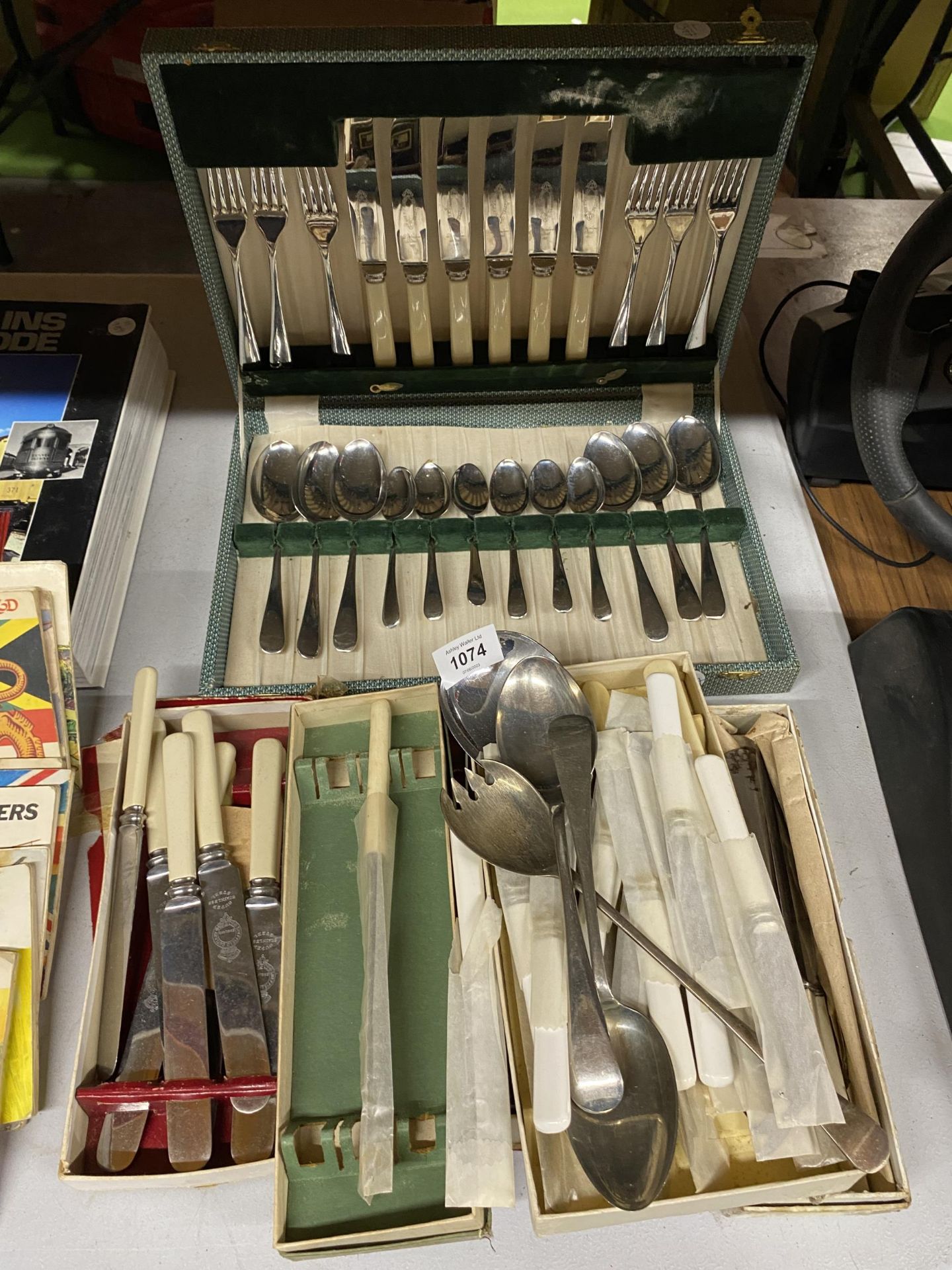 A COLLECTION OF BOXED VINTAGE FLATWARE