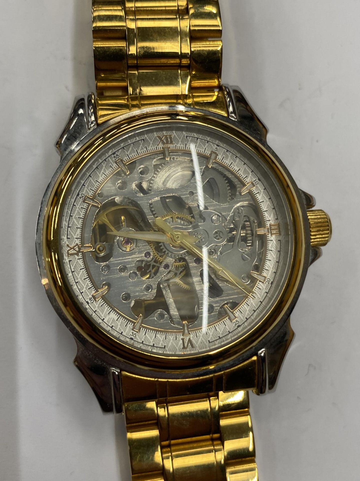 A GENTS SKELETON WATCH, WORKING WHEN CATALOGUED BUT NO WARRANTIES GIVEN - Image 2 of 3