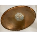 AN ARTS AND CRAFTS HUGH WALLIS COPPER INLAID CHARGER, SIGNED 'H.W', DIAMETER 55CM