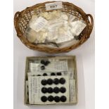 A COLLECTION OF VICTORIAN FRENCH JET BUTTONS AND SMALL BASKET OF OLD PEARL STYLE BUTTONS