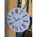 A VINTAGE STYLE WOODEN WALL CLOCK