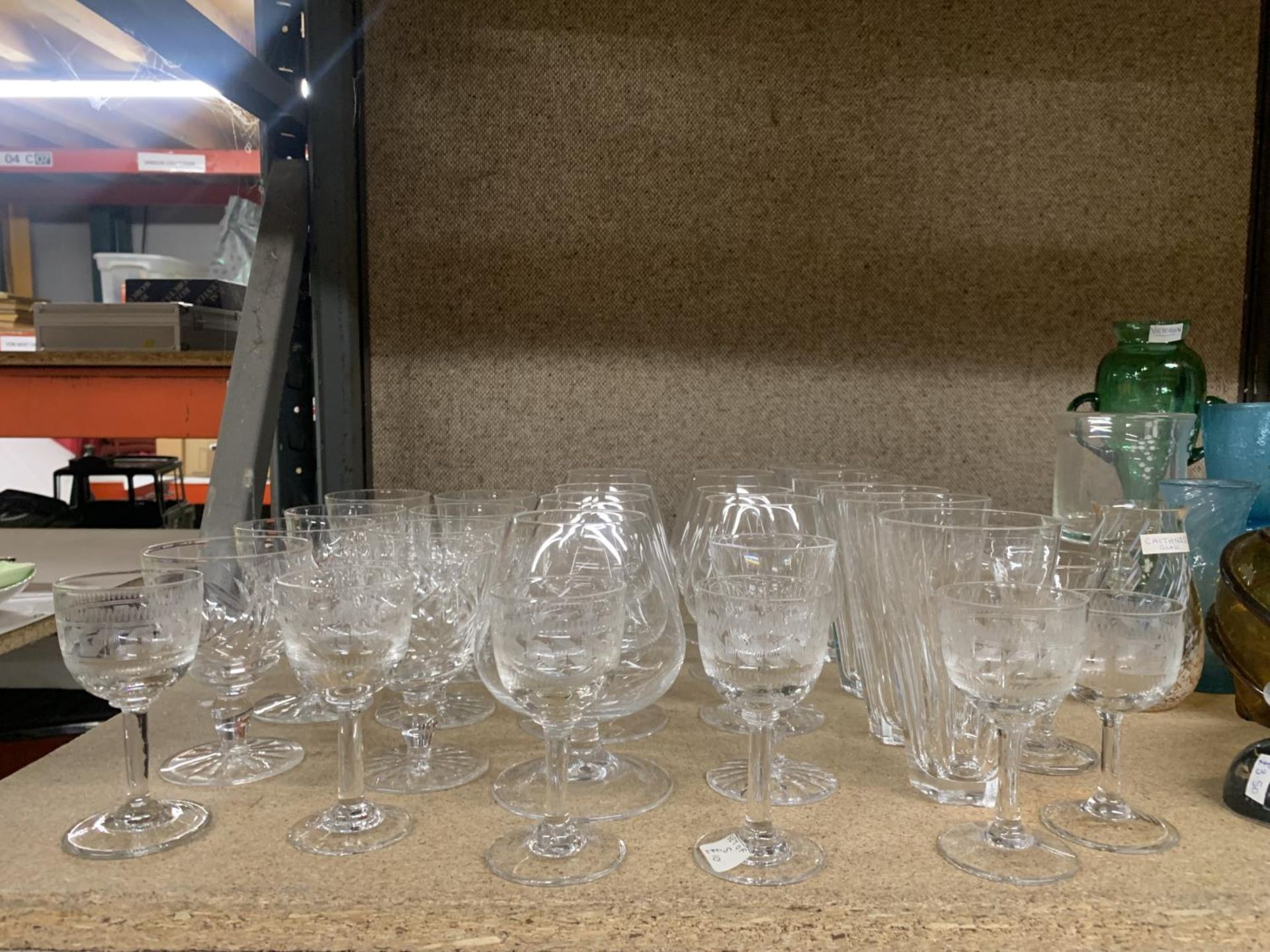 A QUANTITY OF GLASSES TO INCLUDE WINE, BRANDY, SHERRY, PORT, TUMBLERS, ETC