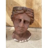 A DECORATIVE FEMALE HEAD RECONSTITUTED STONE PLANTER