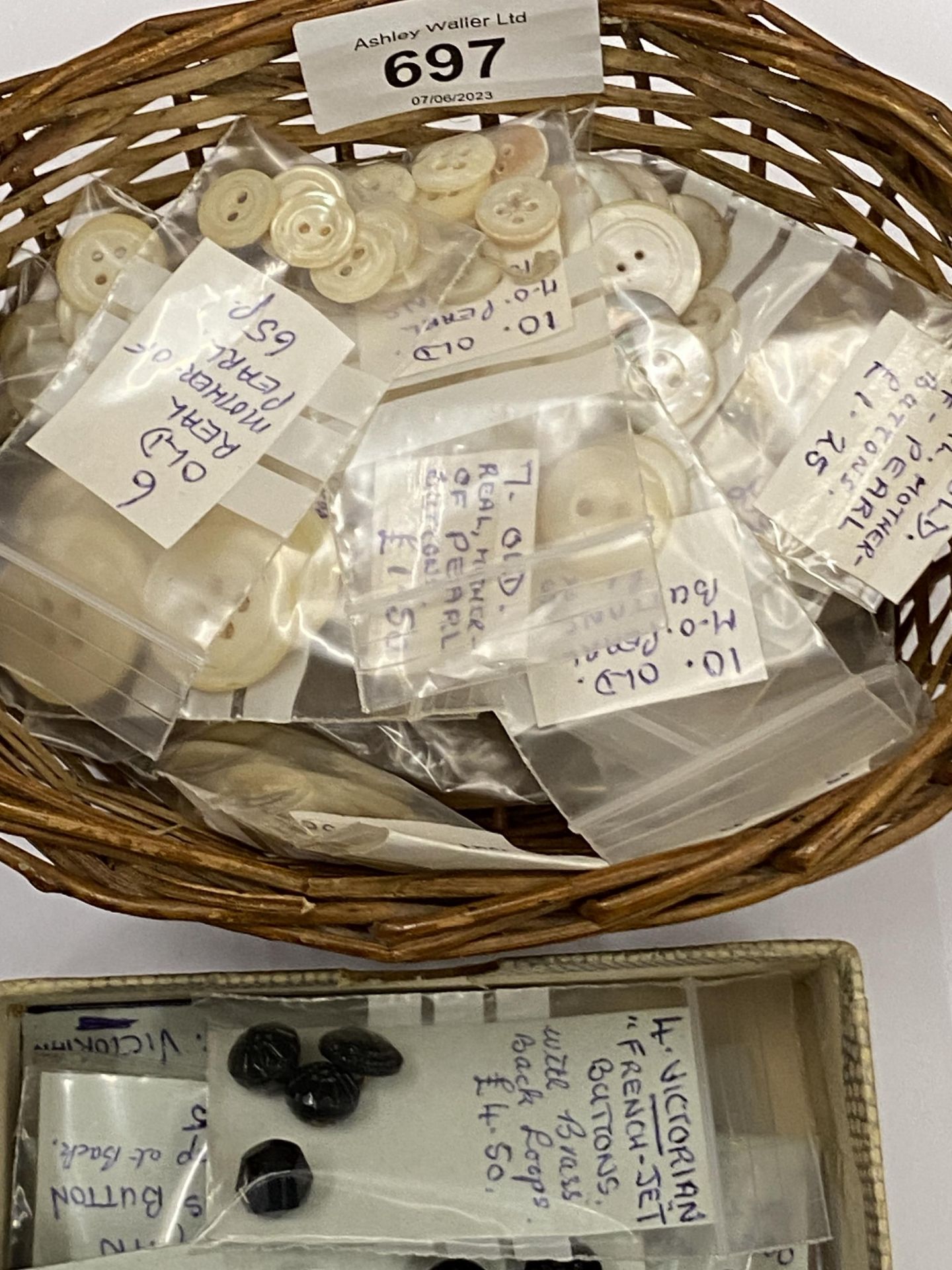 A COLLECTION OF VICTORIAN FRENCH JET BUTTONS AND SMALL BASKET OF OLD PEARL STYLE BUTTONS - Image 2 of 3