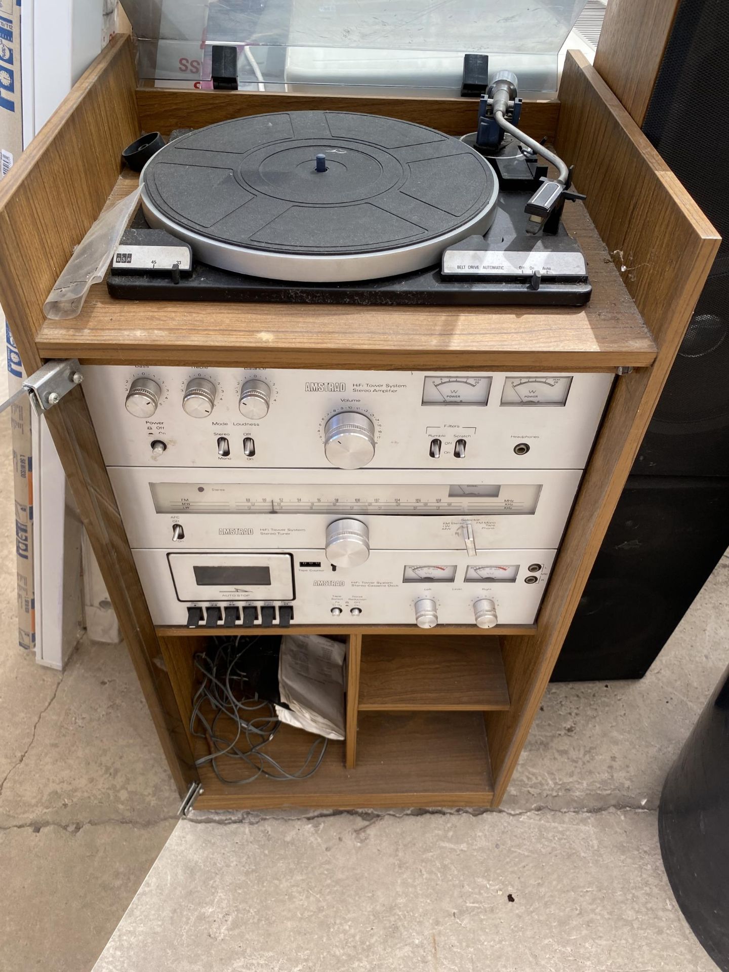 A TEAK RECORD CABINET WITH AN ASSORTMENT OF AMSTRAD STEREO EQUIPMENT AND TWO SPEAKERS - Image 2 of 2
