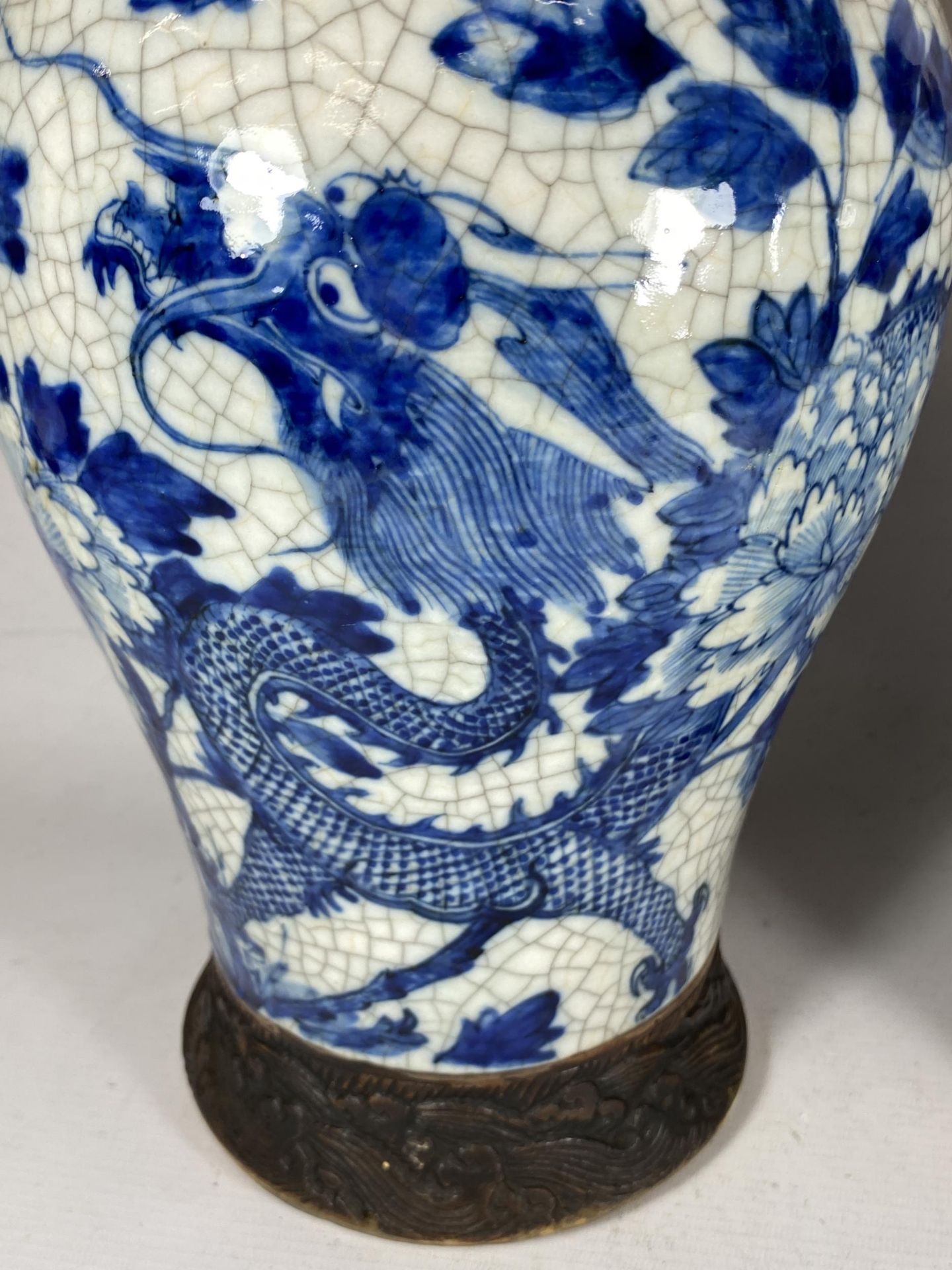 A PAIR OF EARLY 20TH CENTURY CHINESE BLUE AND WHITE CRACKLE GLAZE DRAGON DESIGN VASES, A/F, HEIGHT - Image 7 of 13