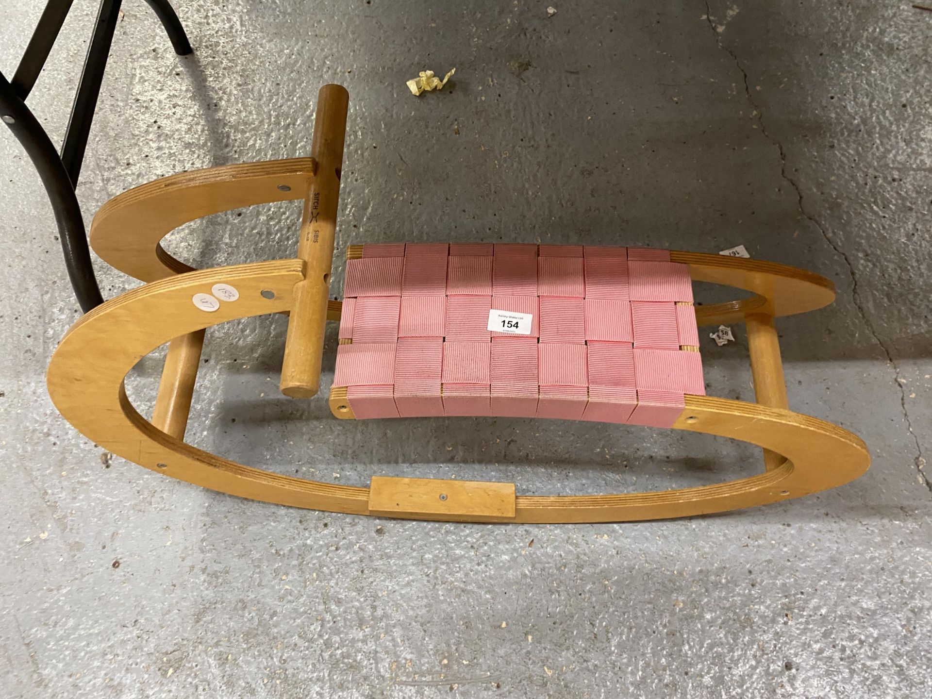 A 'SIRCH' WOODEN CHILD'S ROCKER